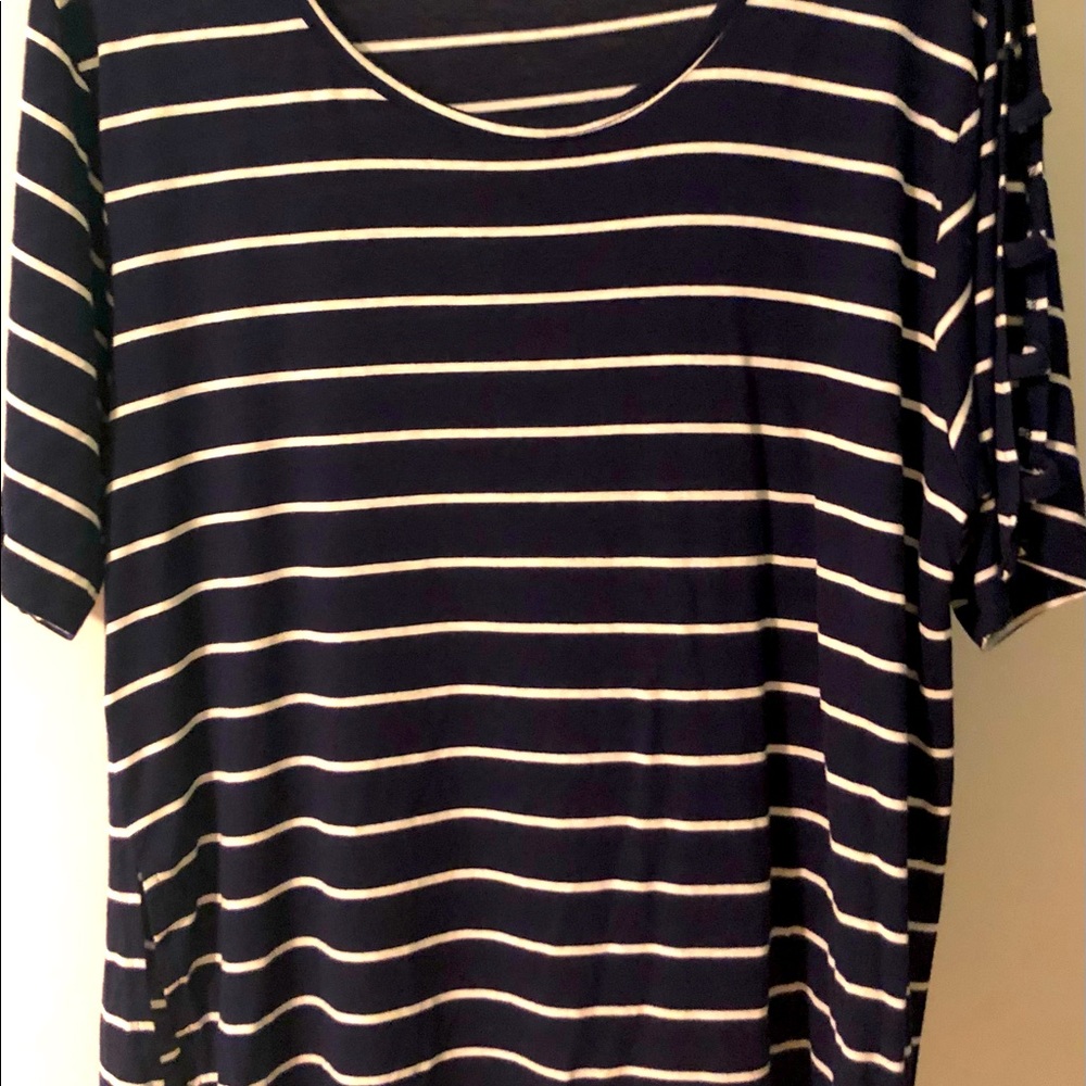 Women’s plus size 3X Navy striped top with cute area cut-our.   Very cute & soft